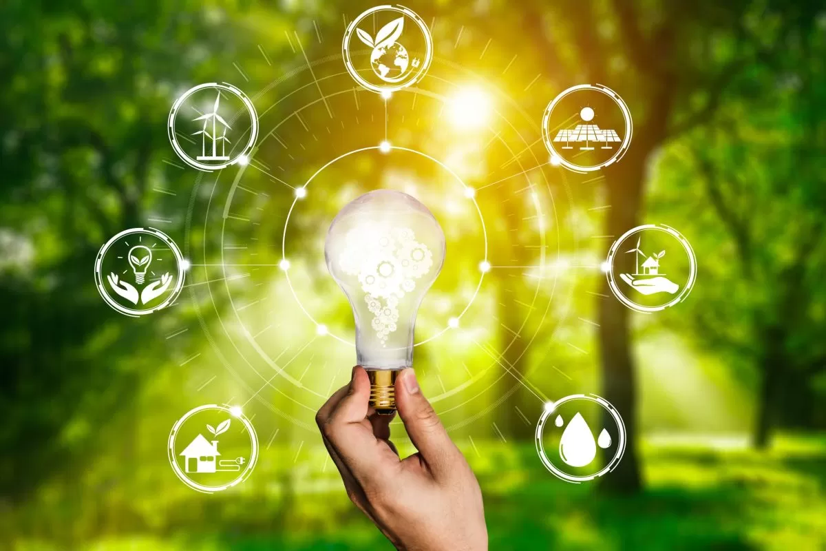 Green energy innovation light bulb with future industry of power generation icon graphic interface. Concept of sustainability development by alternative energy.