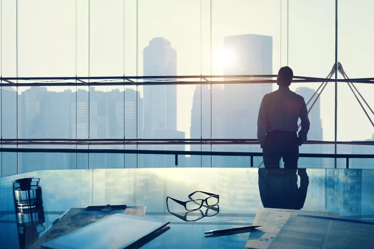 Businessman in a big office